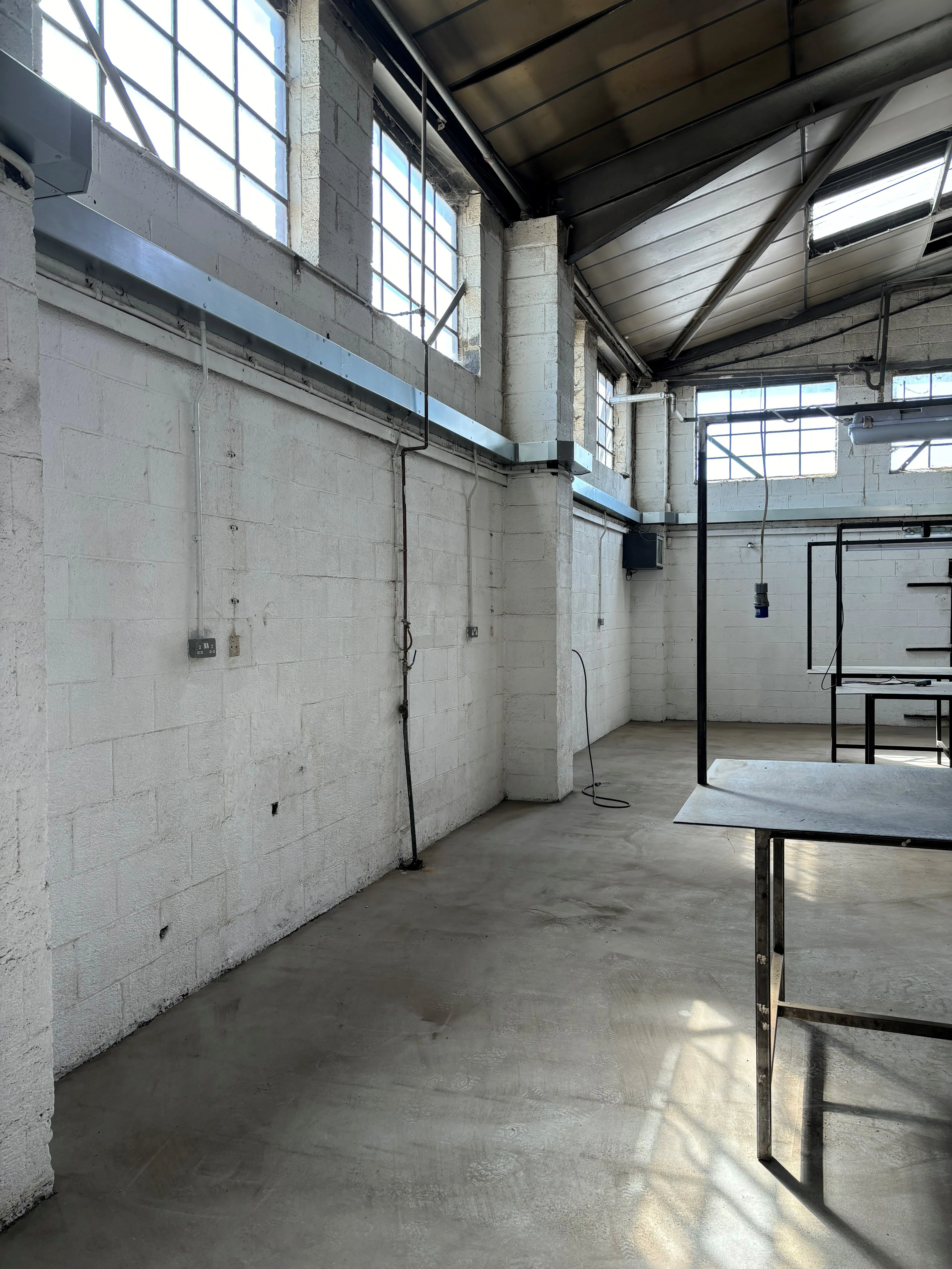 there is a room with a table and a window in it