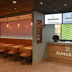 a restaurant with a bunch of tables and chairs