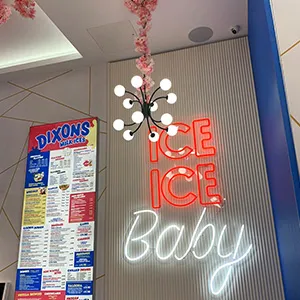 a neon sign that says ice ice baby