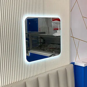a room that has a mirror on the wall