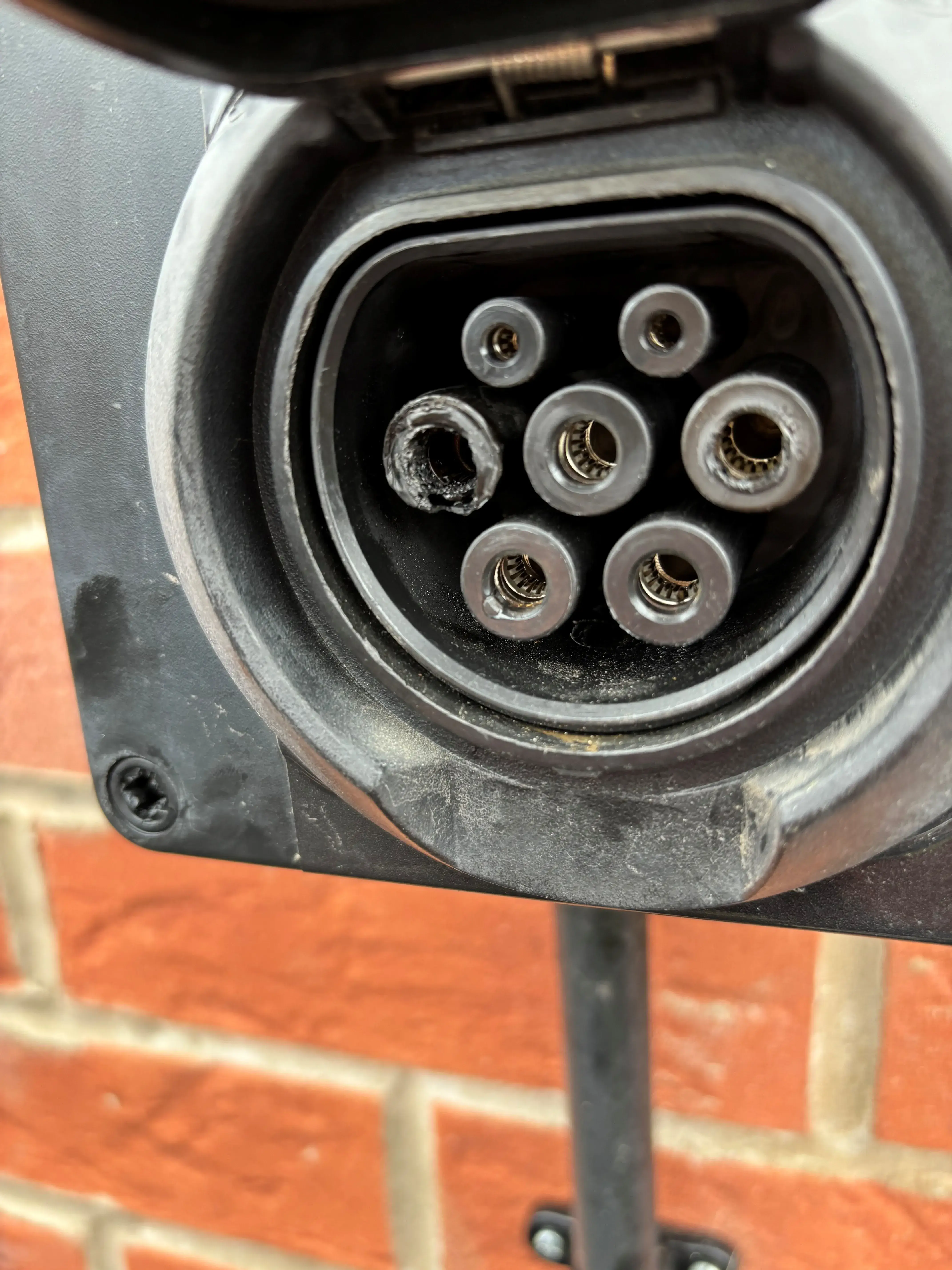 there is a close up of a parking meter with a bunch of wires