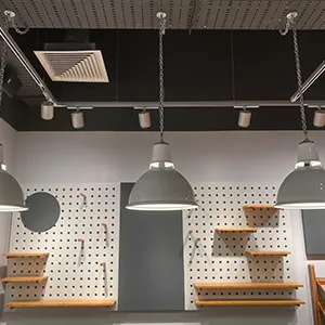 a room with a bunch of lights hanging from the ceiling