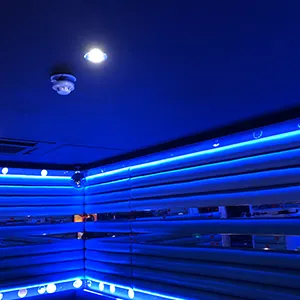 a room that has a lot of lights in it